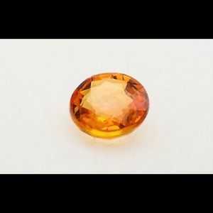Loose cut orange sapphires.